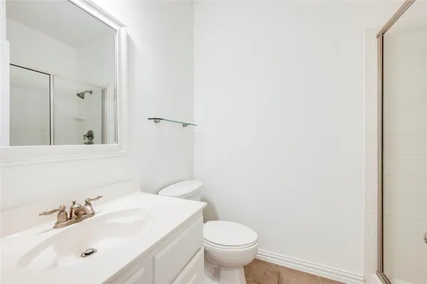 a bathroom with a sink and a toilet