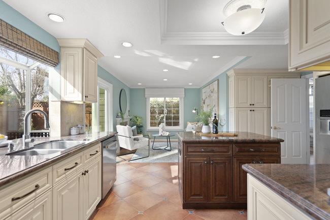122 Jaybee Place San Jose, CA 95123 - Photo 16 of 40 a large kitchen with kitchen island granite countertop a sink and a large window