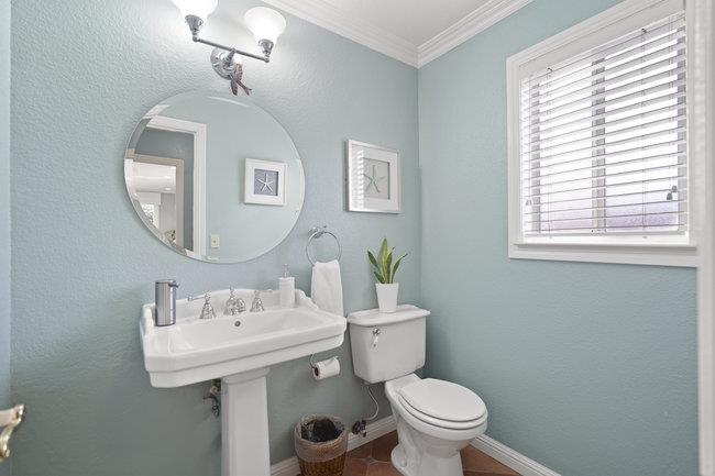122 Jaybee Place San Jose, CA 95123 - Photo 21 of 40 a bathroom with a toilet sink and mirror