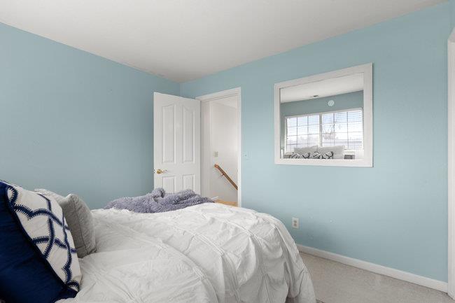 122 Jaybee Place San Jose, CA 95123 - Photo 25 of 40 a bedroom with a bed and a window