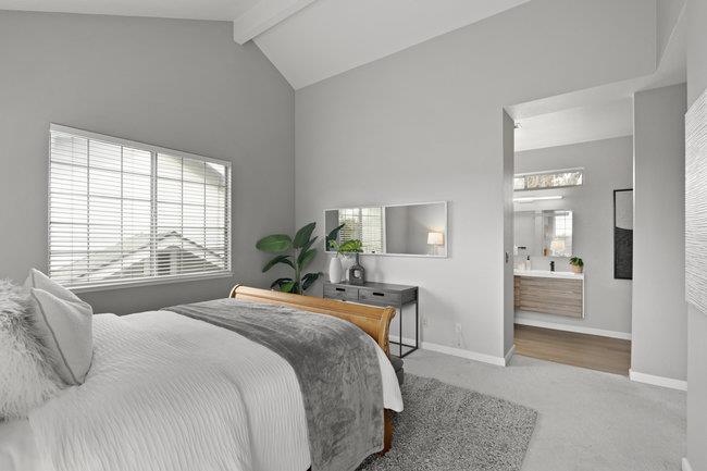 122 Jaybee Place San Jose, CA 95123 - Photo 31 of 40 a bedroom with a large bed and a window