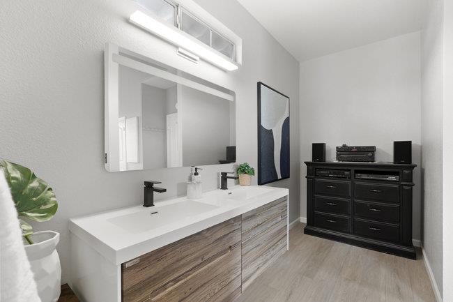 122 Jaybee Place San Jose, CA 95123 - Photo 35 of 40 a bathroom with a sink vanity and a mirror