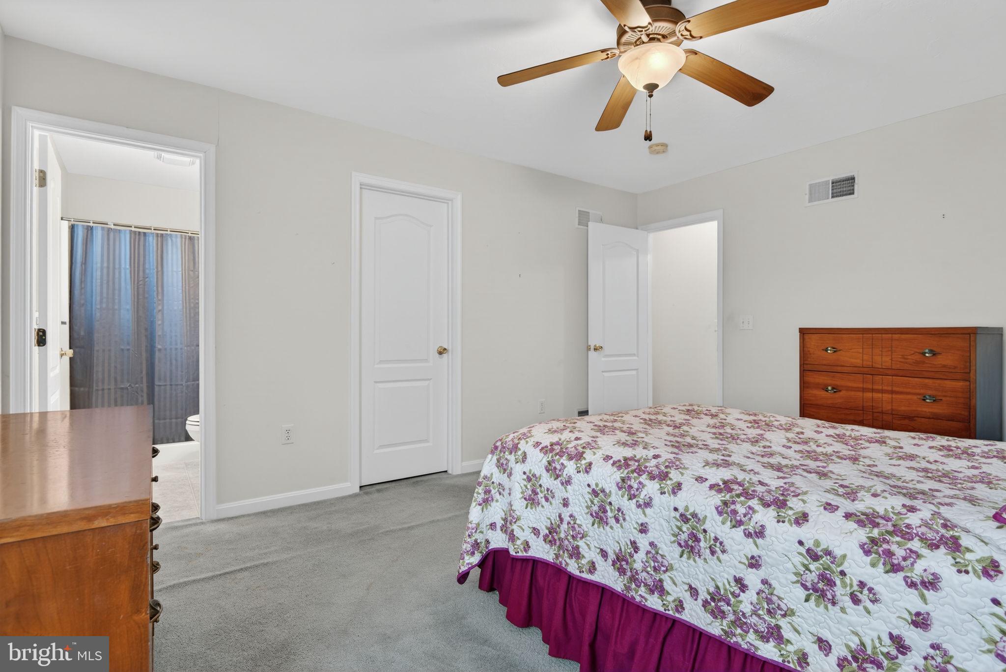 213 Maple Drive Hanover, PA 17331 - Photo 16 of 24 a bedroom with a bed and a dresser