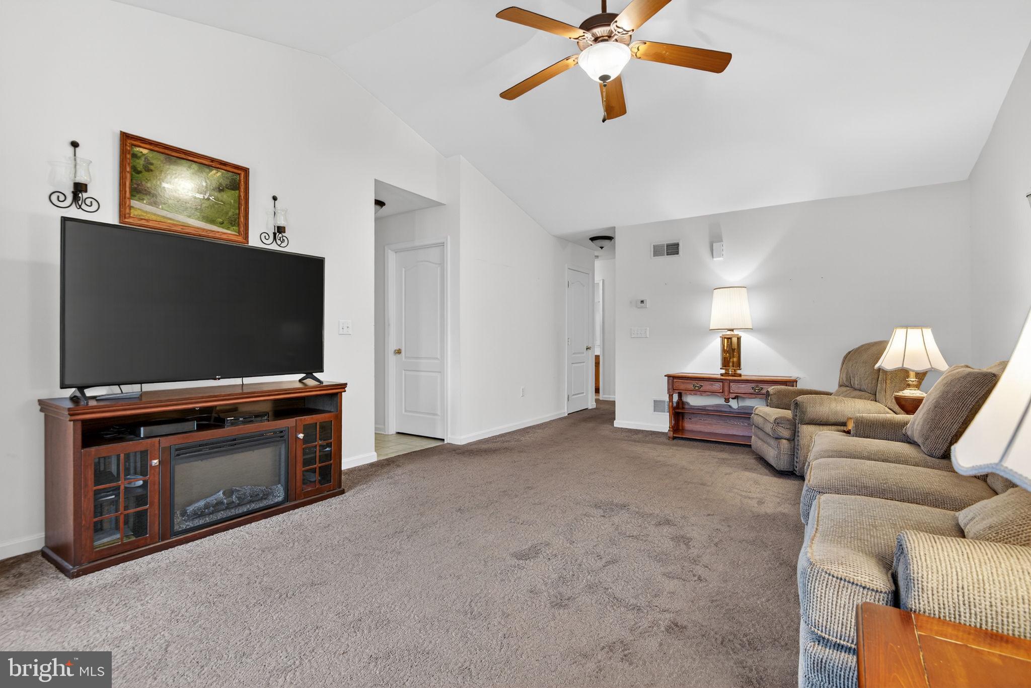 213 Maple Drive Hanover, PA 17331 - Photo 5 of 24 a living room with furniture and a flat screen tv