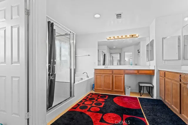 a hall way with furniture and a fireplace