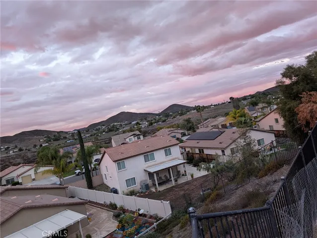 a view of a houses with a city street