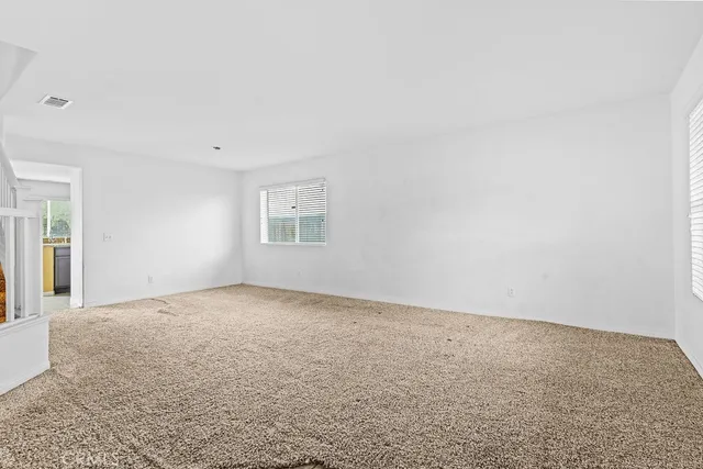 an empty room with a natural light