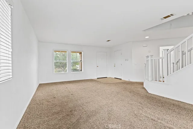 an empty room with windows