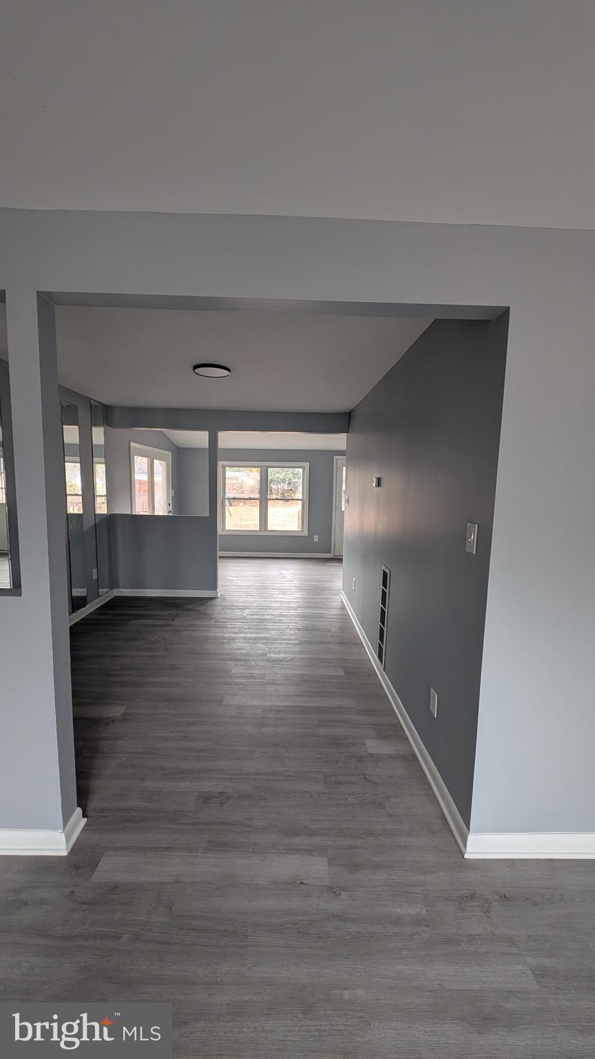728 Aston Martin Drive Lindenwold, NJ 08021 - Photo 6 of 12 a view of wooden floor and windows in a room