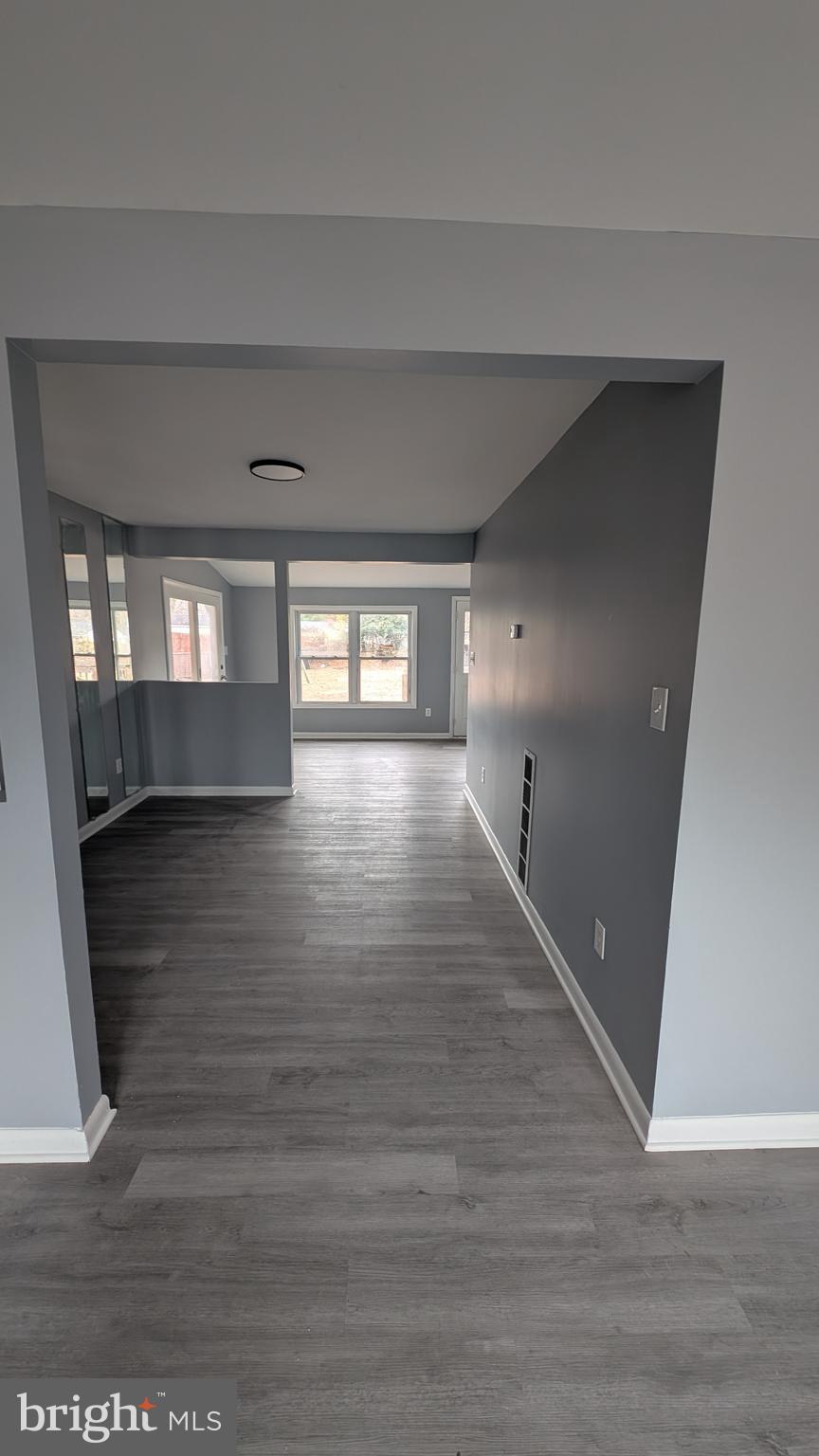 728 Aston Martin Drive Lindenwold, NJ 08021 - Photo 7 of 12 a view of wooden floor and windows in a room