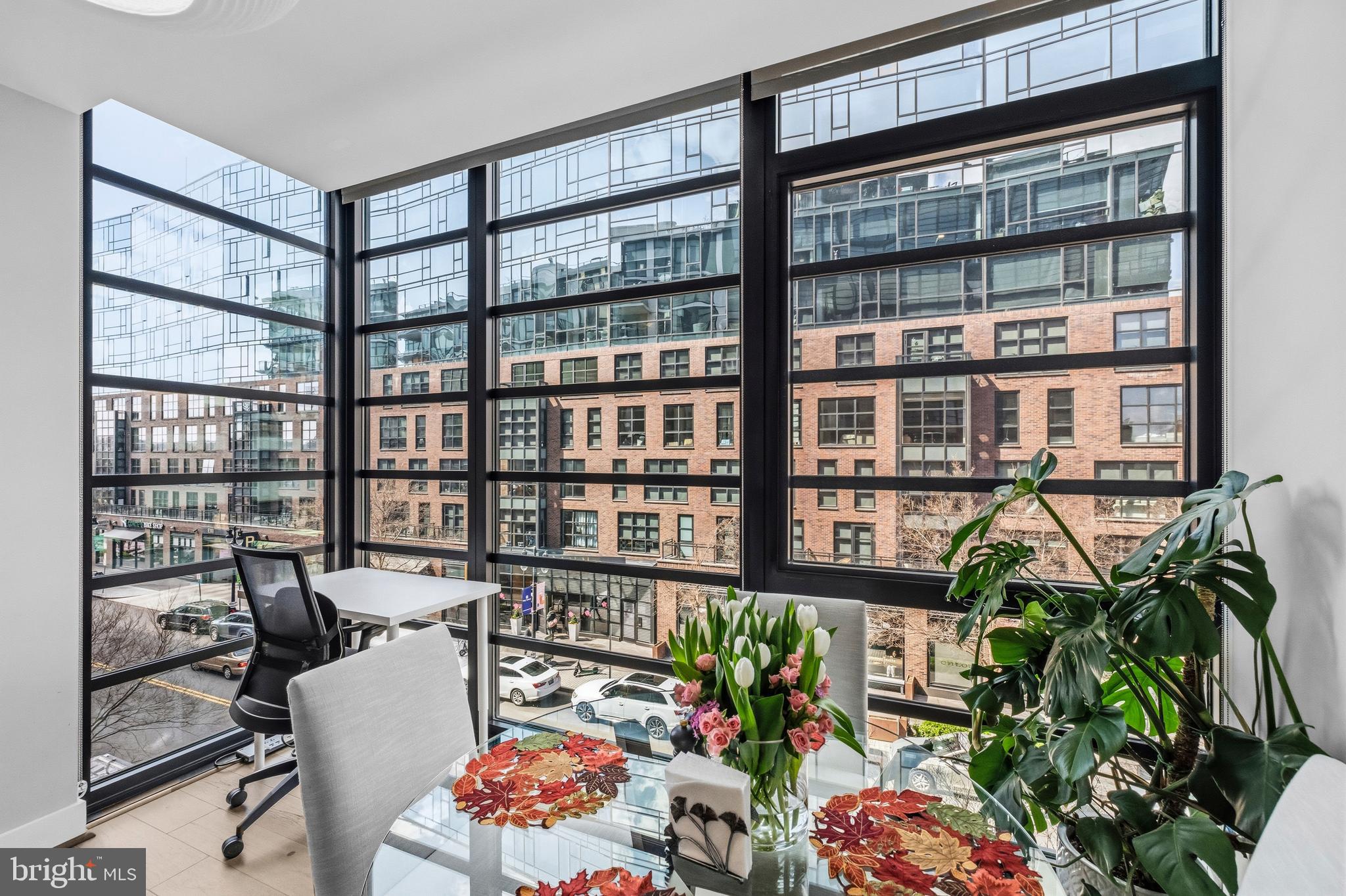 1300 4th Street Southeast, Unit 303 Washington, DC 20003 - Photo 2 of 42 a living room filled with furniture