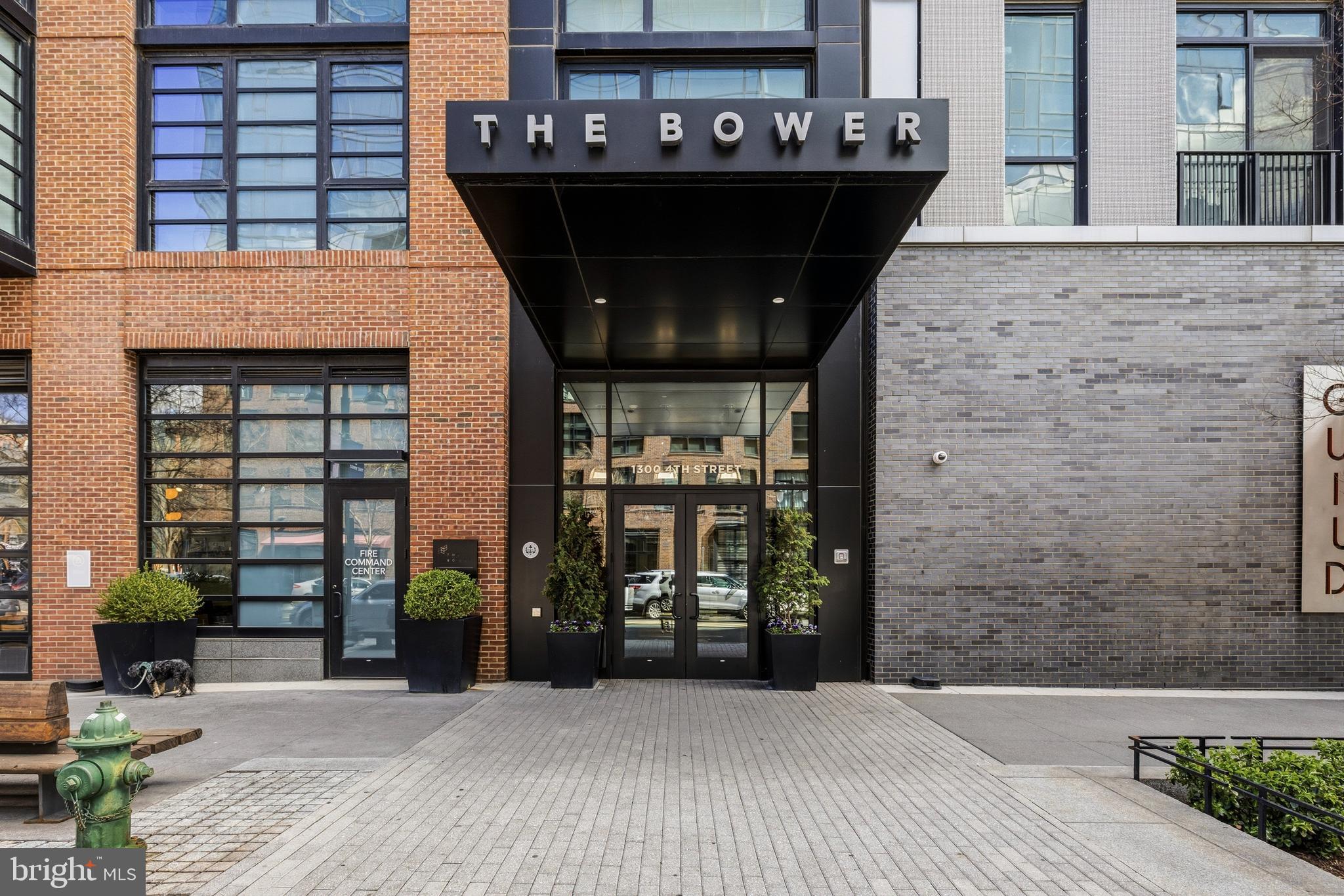 1300 4th Street Southeast, Unit 303 Washington, DC 20003 - Photo 31 of 42 a front view of a building with glass windows