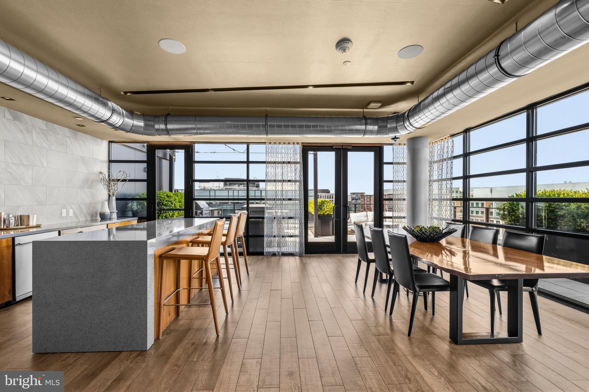 1300 4th Street Southeast, Unit 303 Washington, DC 20003 - Photo 35 of 42 a dining room with furniture window and wooden floor