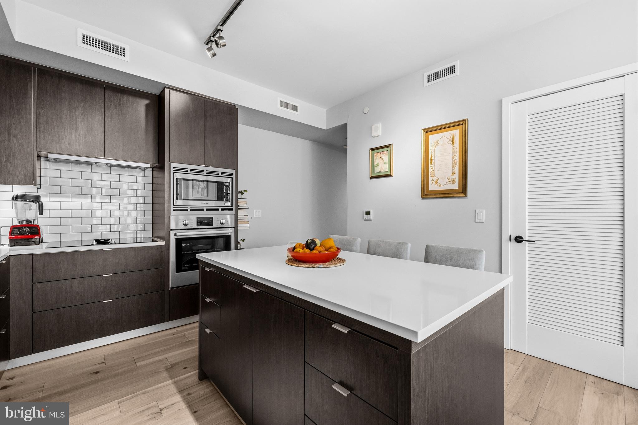 1300 4th Street Southeast, Unit 303 Washington, DC 20003 - Photo 6 of 42 a kitchen with a cabinets and window