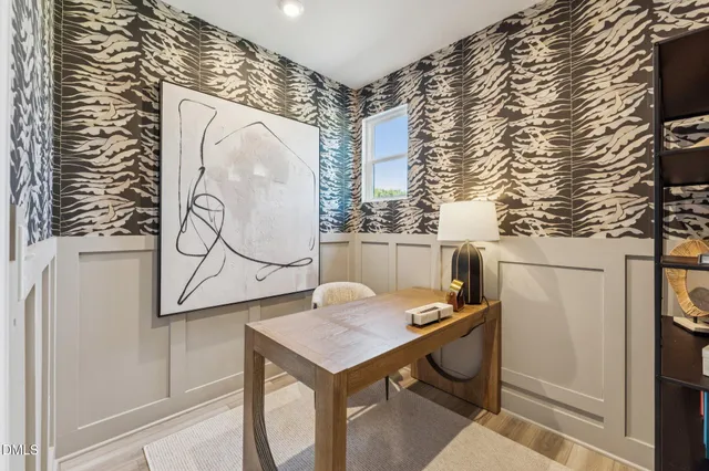 a bathroom with a sink toilet a mirror and shower