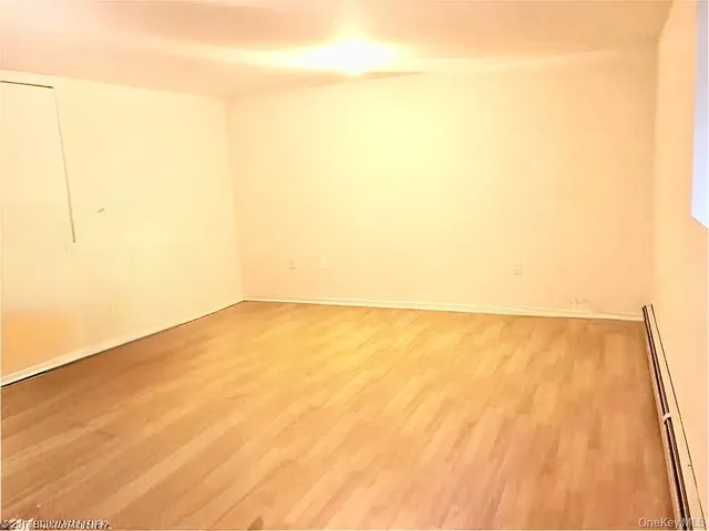 a view of a car park in front of house