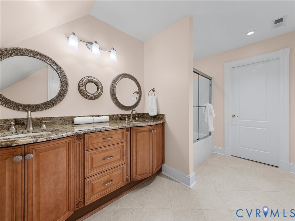 13612 Waterswatch Court Midlothian, VA 23113 - Photo 76 of 88 a bathroom with a granite countertop sink mirror and vanity