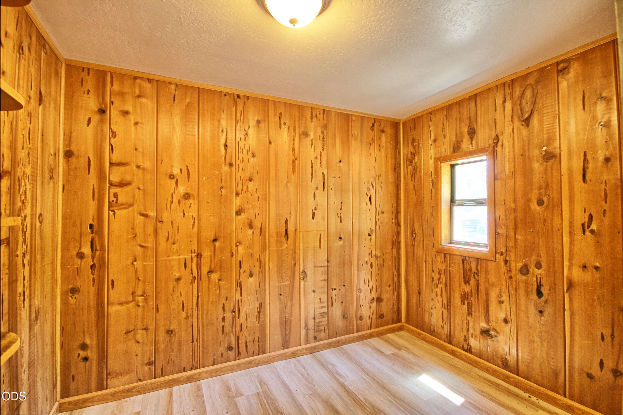 2525 Kinney Creek Road Jacksonville, OR 97530 - Photo 27 of 38 a view of a porch with a wooden floor and curtain
