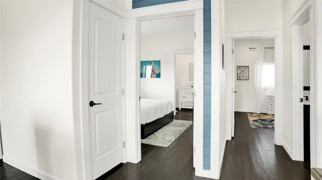 a bedroom with a bed and a table