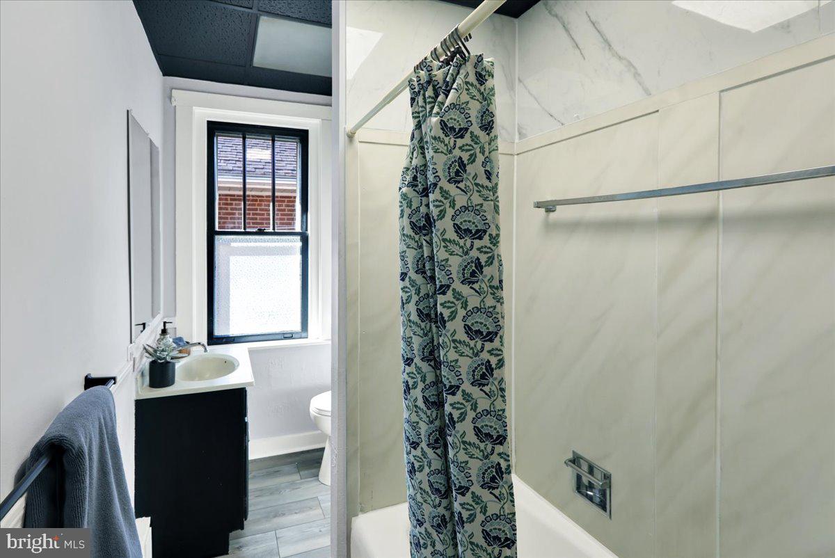 2133 Fairview Street Reading, PA 19609 - Photo 12 of 34 a bathroom with a bathtub and shower