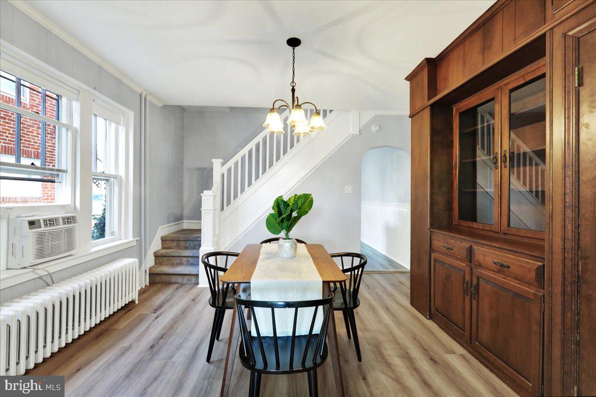 2133 Fairview Street Reading, PA 19609 - Photo 7 of 34 a view of a dining room with furniture window and wooden floor