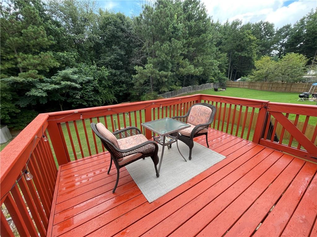 1720 Fort Daniels Trail Dacula, GA 30019 - Photo 25 of 32 a view of sitting area on wooden deck