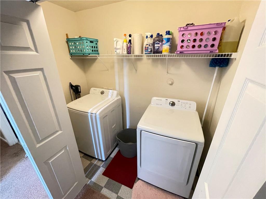 1720 Fort Daniels Trail Dacula, GA 30019 - Photo 29 of 32 a utility room with dryer and washer