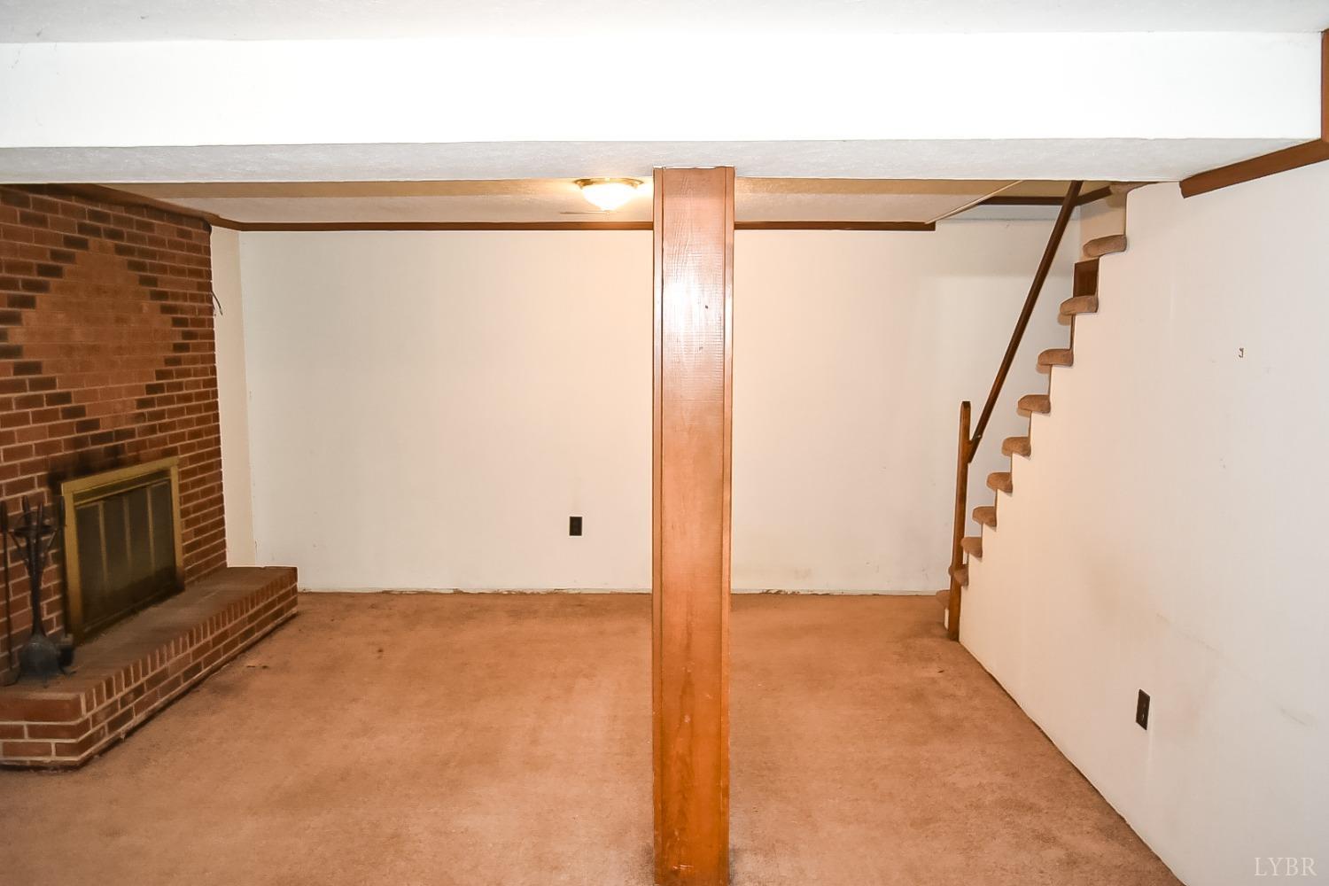 243 West Spencer Road Hurt, VA 24563 - Photo 16 of 28 a view of an empty room with a fireplace