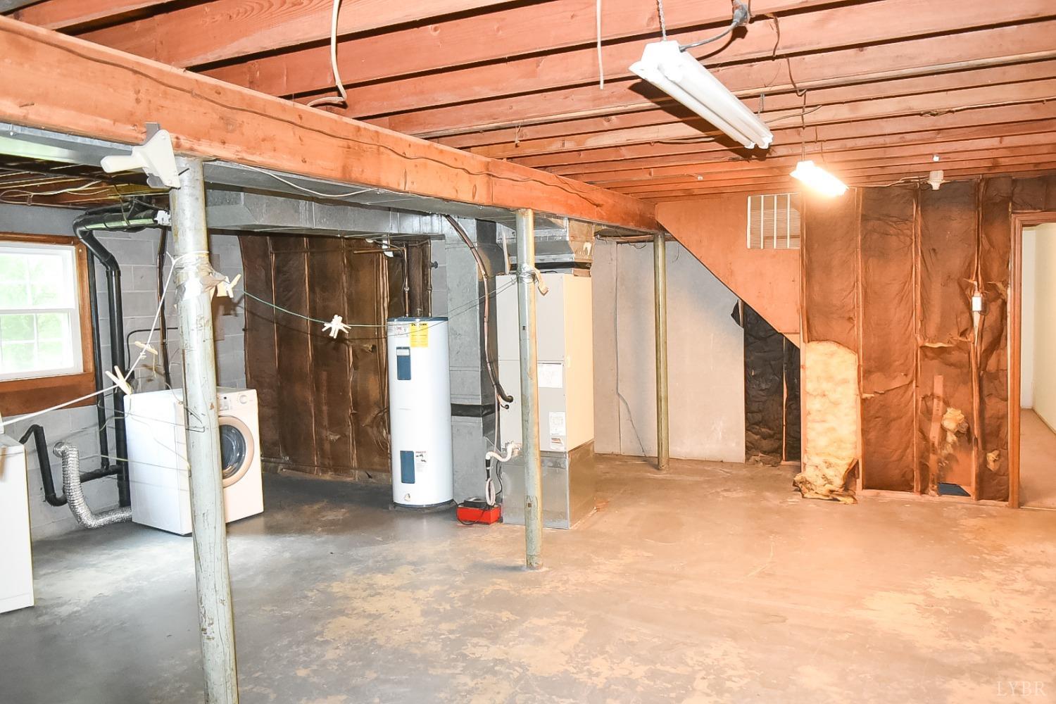 243 West Spencer Road Hurt, VA 24563 - Photo 20 of 28 a view of empty room with wooden walls