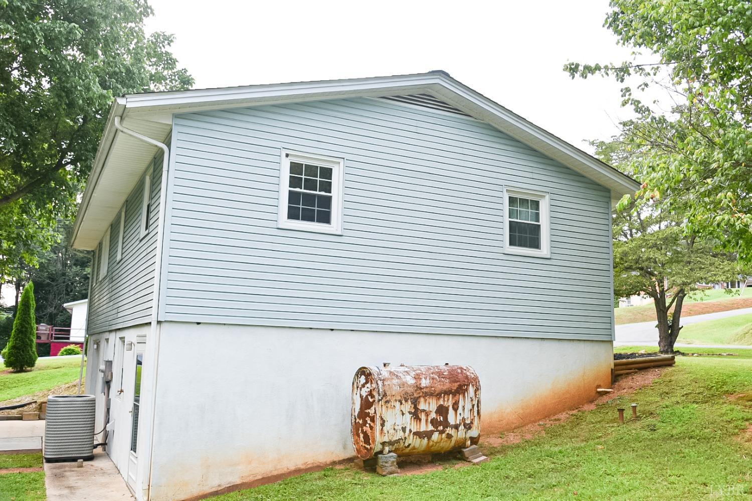 243 West Spencer Road Hurt, VA 24563 - Photo 24 of 28 a front view of a house with garden