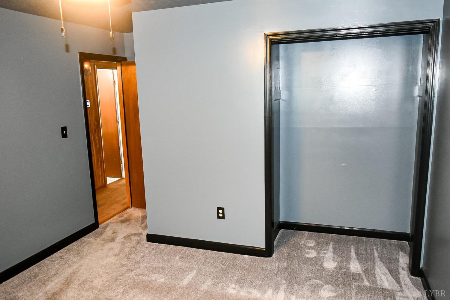 243 West Spencer Road Hurt, VA 24563 - Photo 8 of 28 a view of an empty room with a glass door