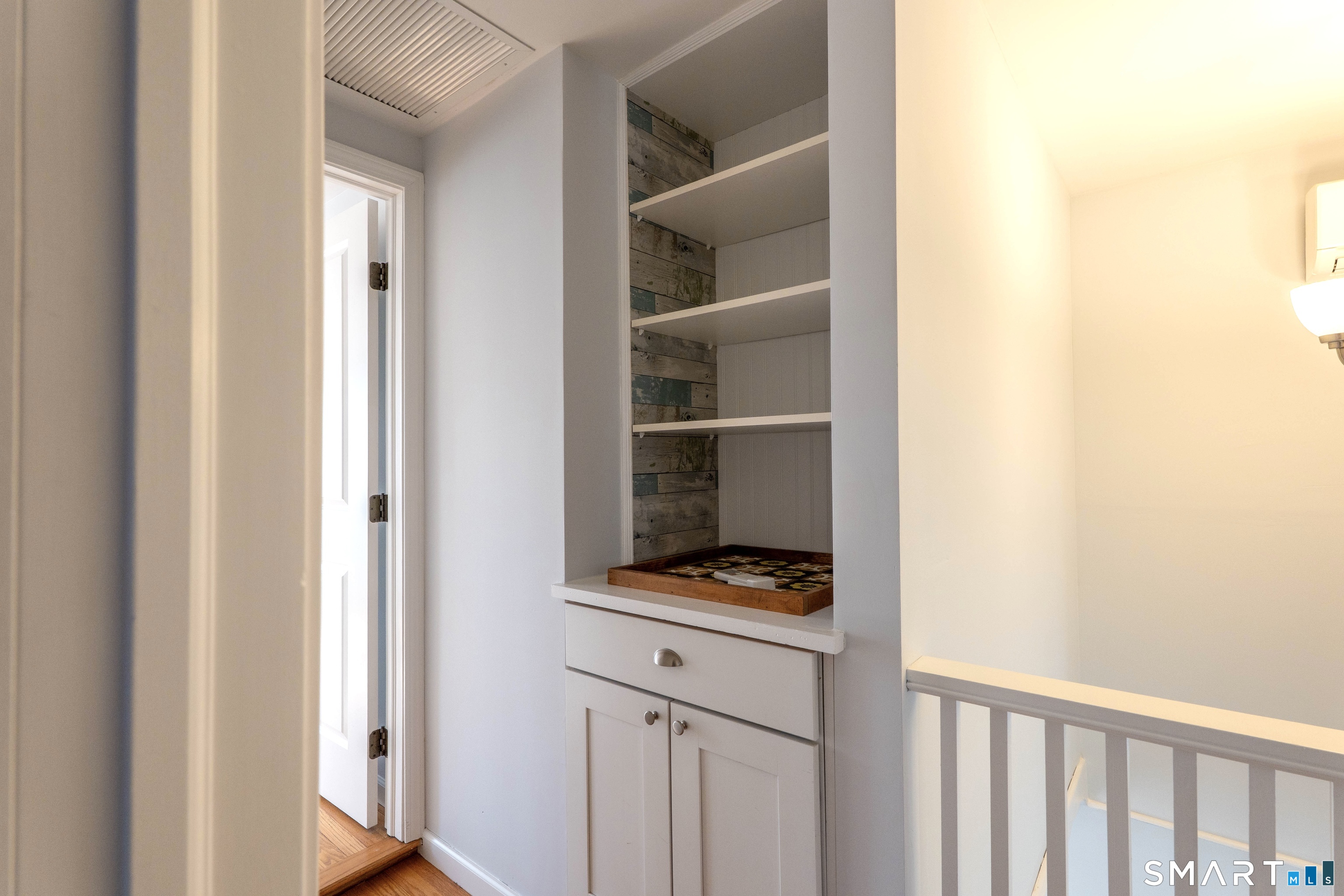 19 Elaine Road Milford, CT 06460 - Photo 15 of 24 a room with closet and wooden floor