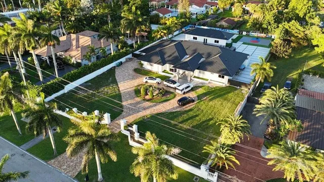 a view of swimming pool with a yard