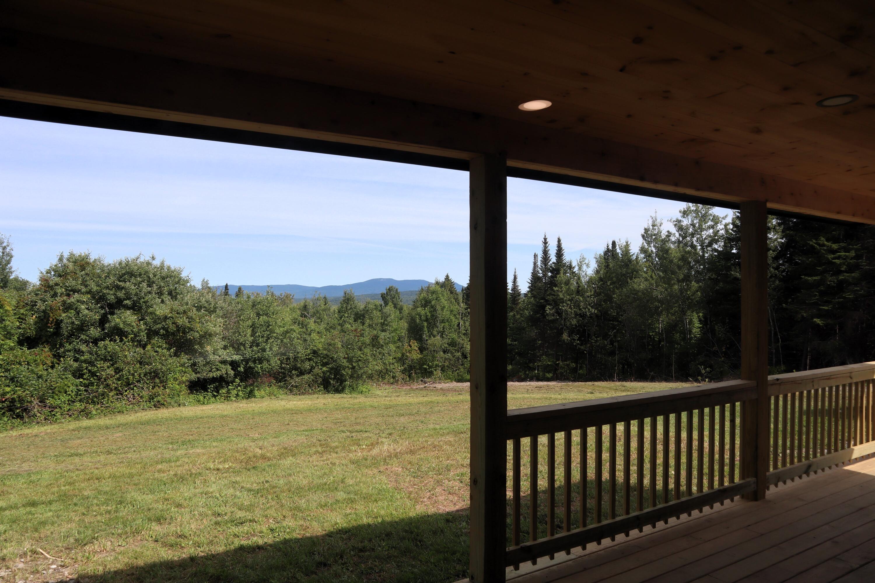 297 Main Street Jackman, ME 04945 - Photo 6 of 14 Hoyt 6 Front Porch view