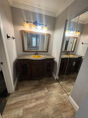 a view of an empty room and a window