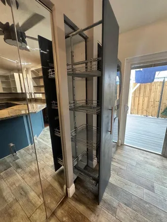 a view of a kitchen washer and dryer