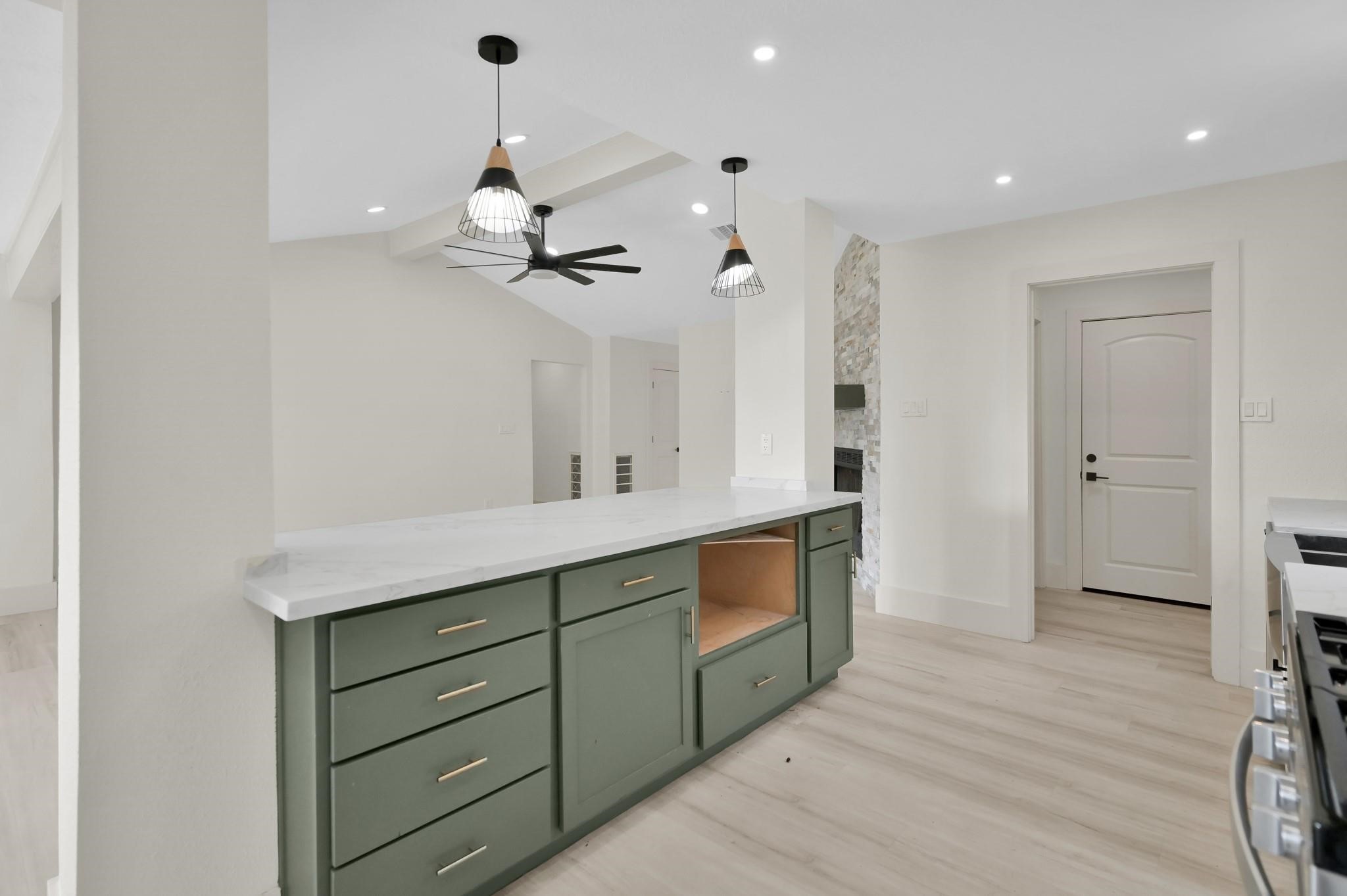 6026 Willowbend Boulevard Houston, TX 77096 - Photo 15 of 46 a view of cabinets and wooden floor