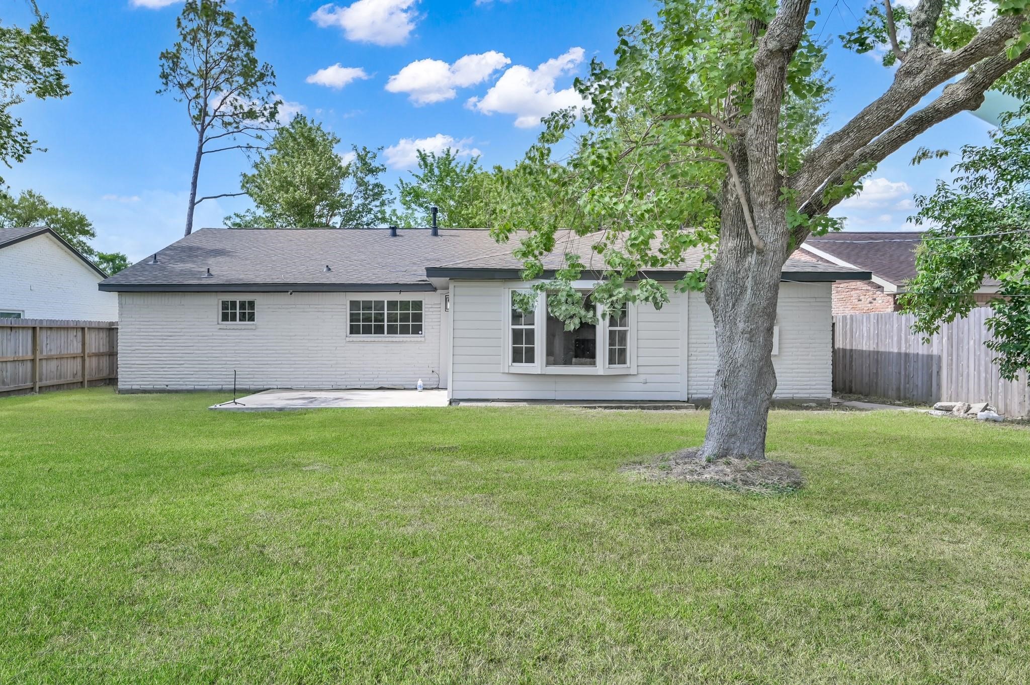 6026 Willowbend Boulevard Houston, TX 77096 - Photo 45 of 46 a house view with a garden space