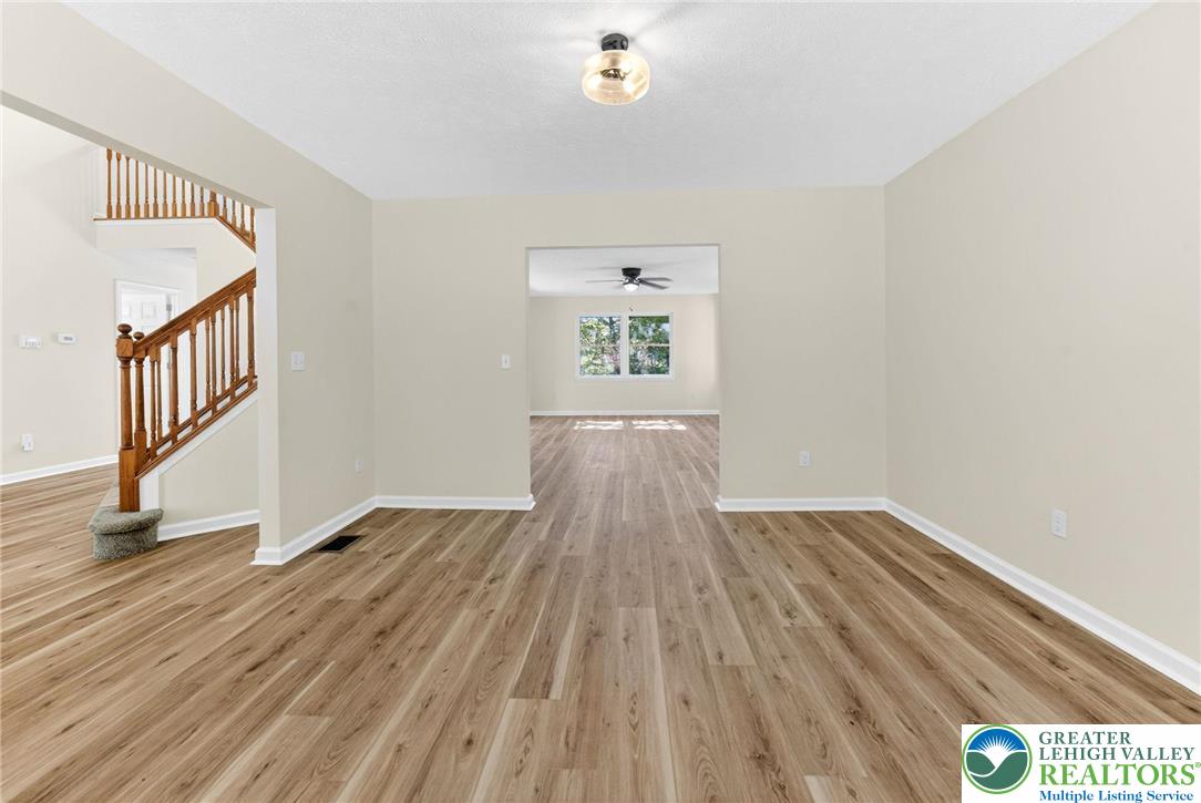 45 Coach Road Stroudsburg, PA 18360 - Photo 20 of 44 a view of an empty room with wooden floor and a window