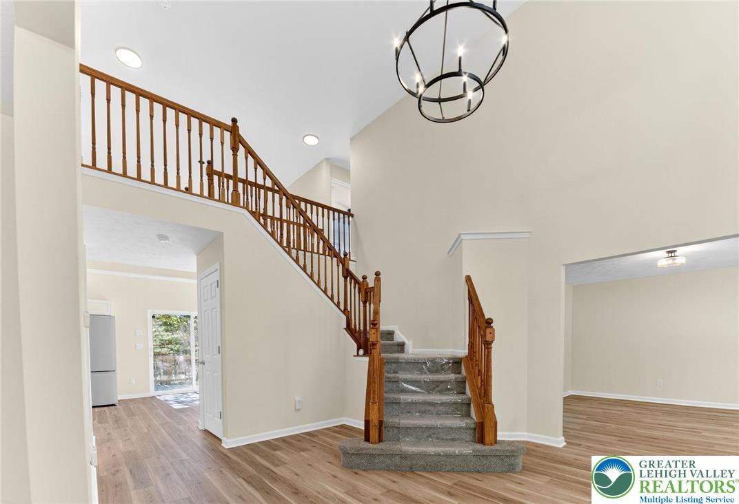 45 Coach Road Stroudsburg, PA 18360 - Photo 3 of 44 a view of staircase with white walls and a window