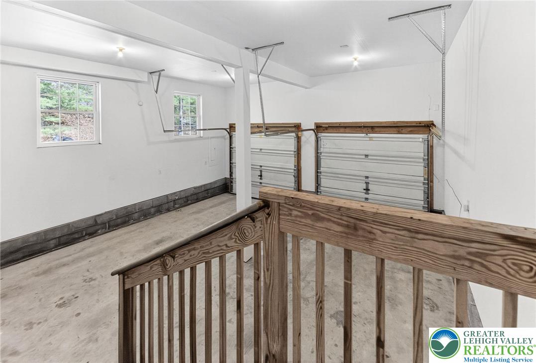 45 Coach Road Stroudsburg, PA 18360 - Photo 38 of 44 a spacious bathroom with a granite countertop sink and a window