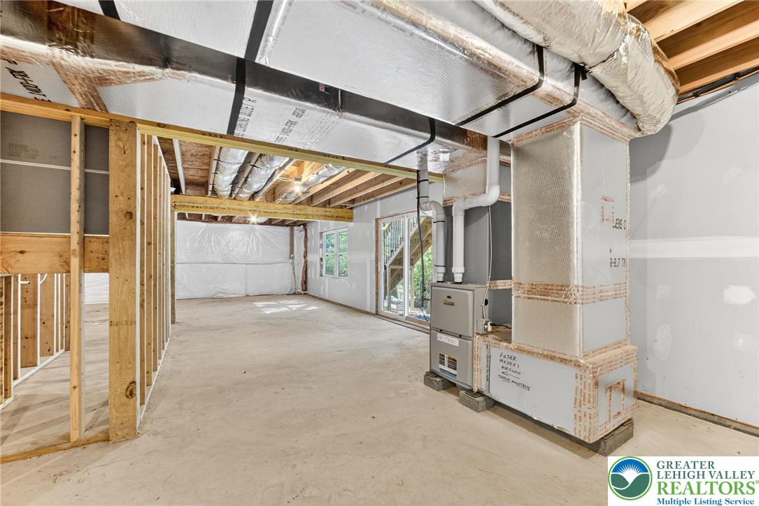 45 Coach Road Stroudsburg, PA 18360 - Photo 39 of 44 a view of a garage with wooden table and chairs