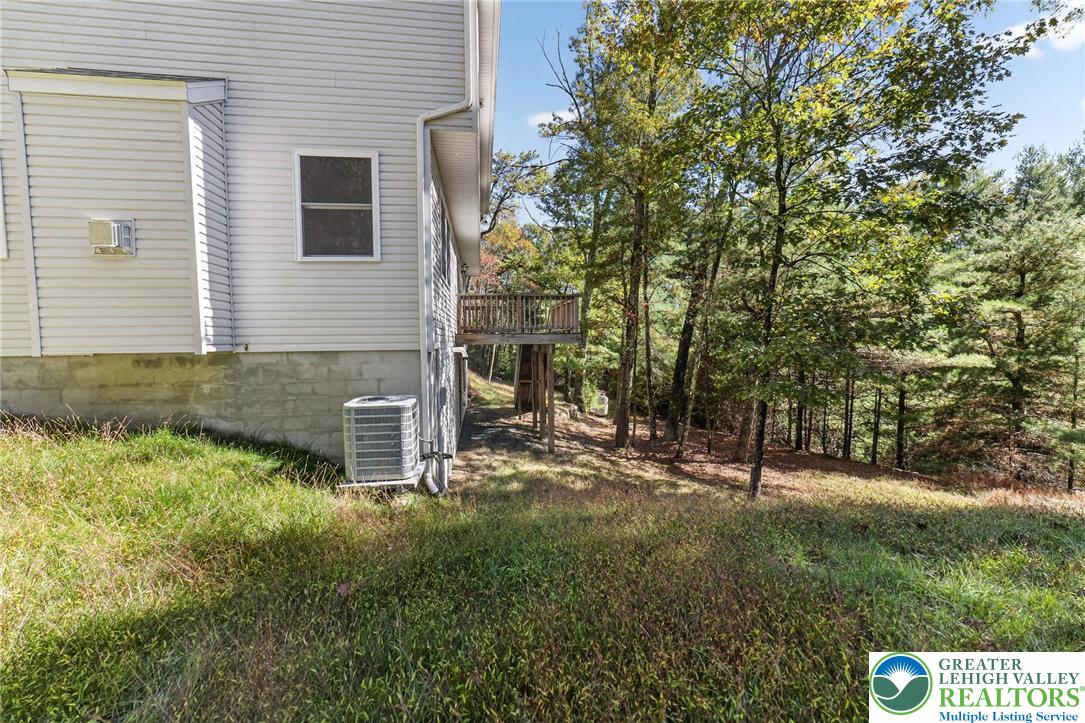 45 Coach Road Stroudsburg, PA 18360 - Photo 43 of 44 a view of backyard with trees