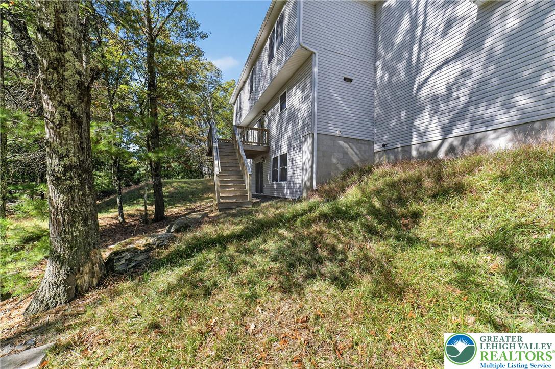 45 Coach Road Stroudsburg, PA 18360 - Photo 44 of 44 a view of a pathway of a building