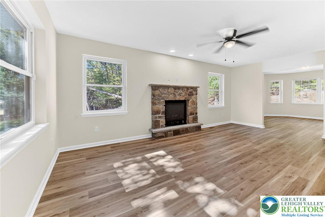 45 Coach Road Stroudsburg, PA 18360 - Photo 6 of 44 a view of an empty room with a window and fireplace