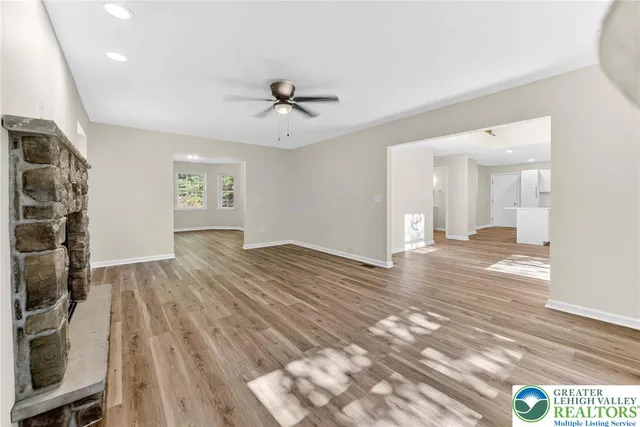 a view of an empty room and window