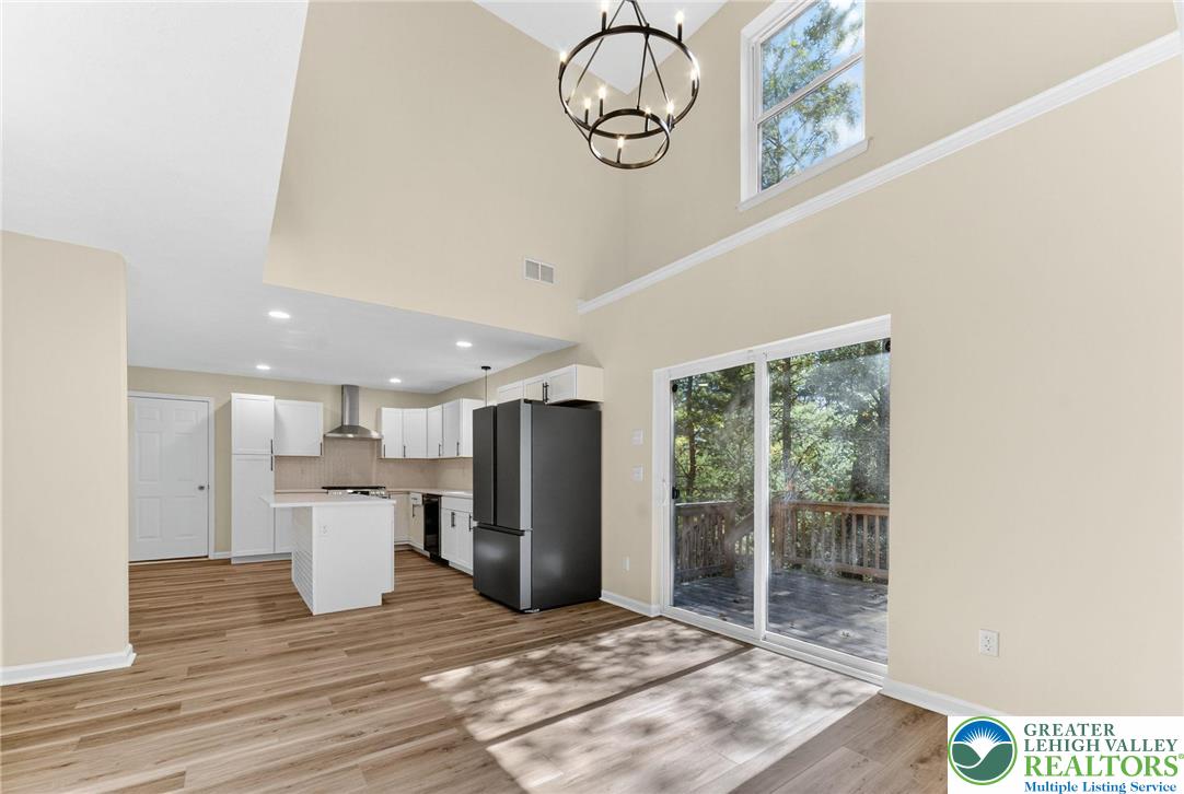45 Coach Road Stroudsburg, PA 18360 - Photo 10 of 44 a view of a kitchen with refrigerator and windows