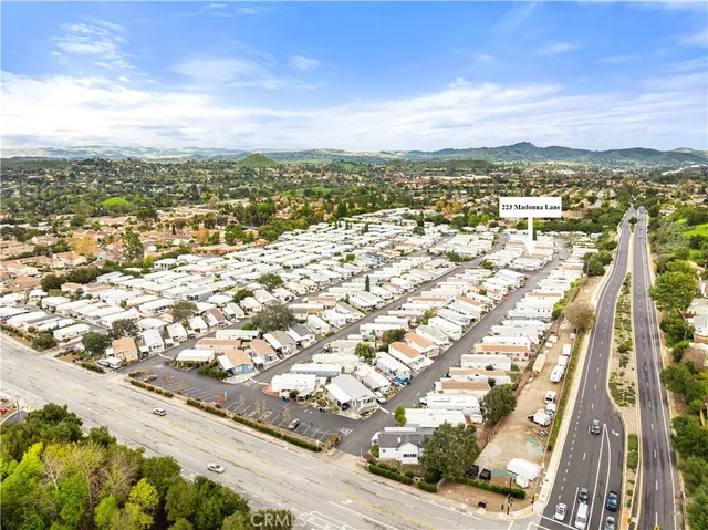 an aerial view of residential building with parking space