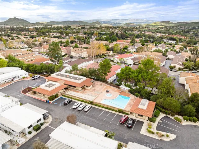 an aerial view of a city with lots of residential buildings