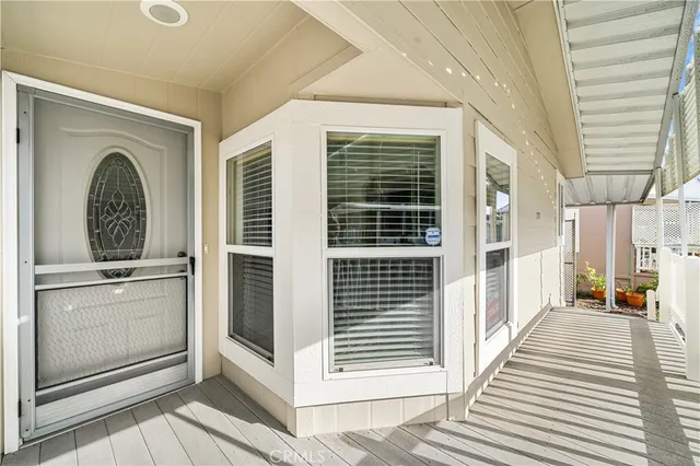 a view of a hallway with washer and dryer